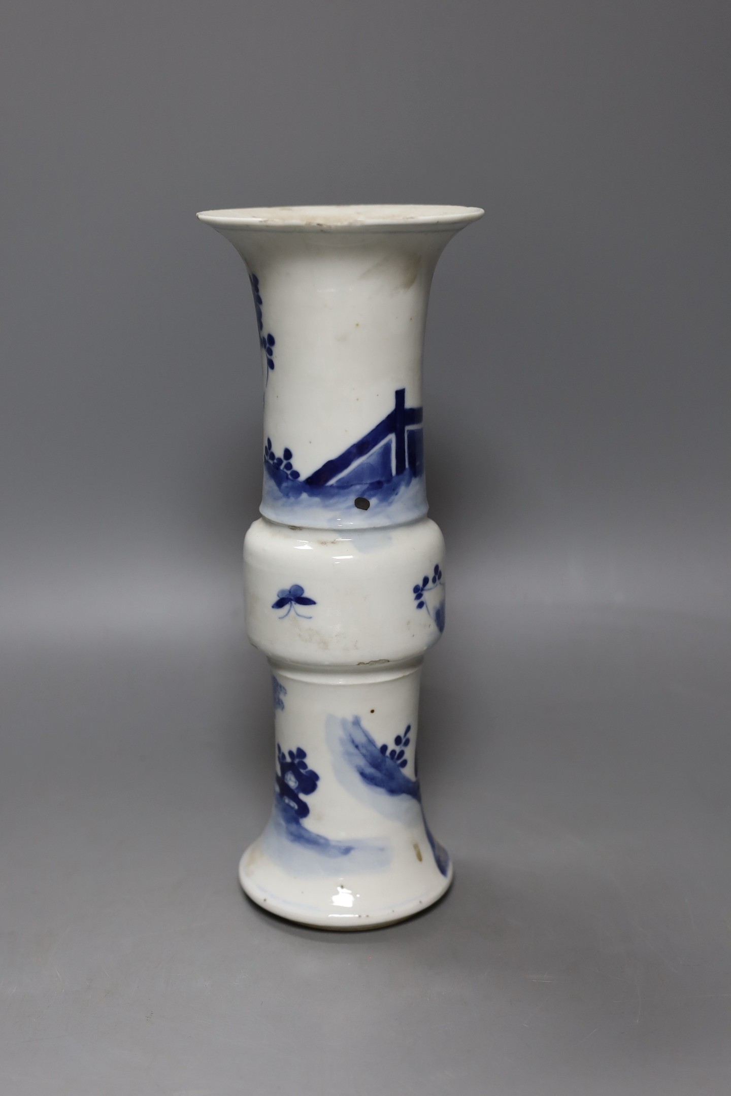 A 19th century Chinese blue and white beaker vase - 27cm tall